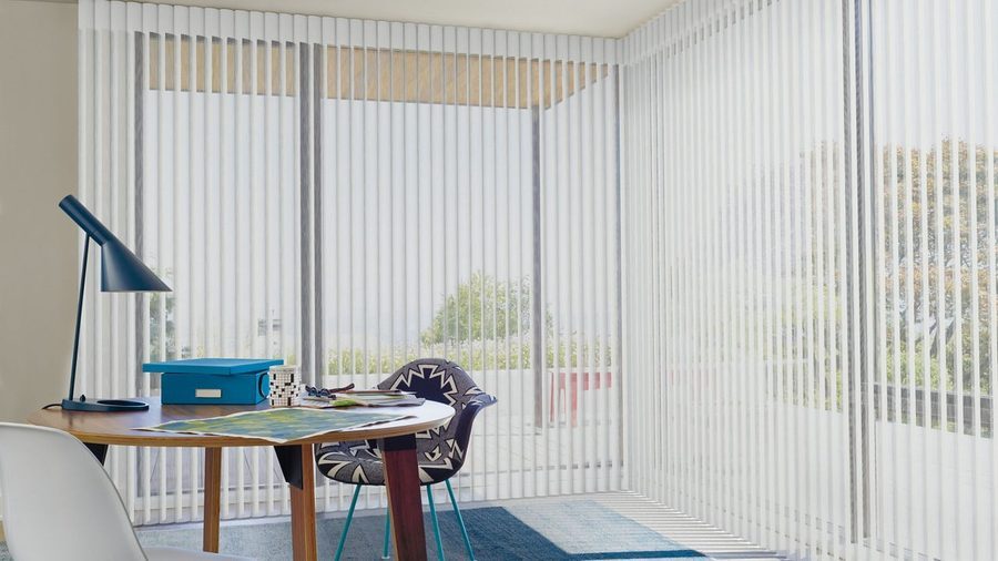 Hunter Douglas Luminette Privacy Sheers on large windows in a Tampa Bay home — installed by Accolade Interiors