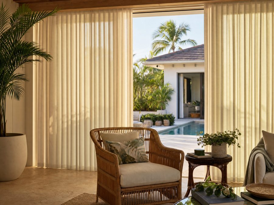 Hunter Douglas Luminette Privacy Sheers on a sliding glass door in a Florida home — installed by Accolade Interiors Tampa Bay